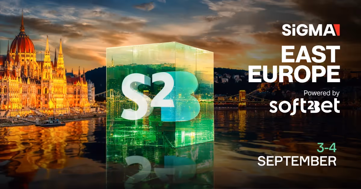 Banner της εκδήλωσης SiGMA East Europe με κύβο με το σήμα της Soft2Bet πάνω από τη Βουδαπέστη